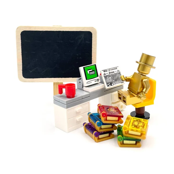 Golden Businessman Working Desktop Blackboard Computer Books Lego Figure Photography — Stok fotoğraf