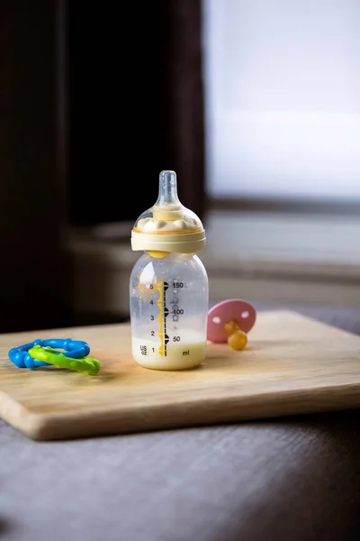 Portrait Baby Bottle Bit Formula Still Standing Wooden Plank Glass — Foto de Stock