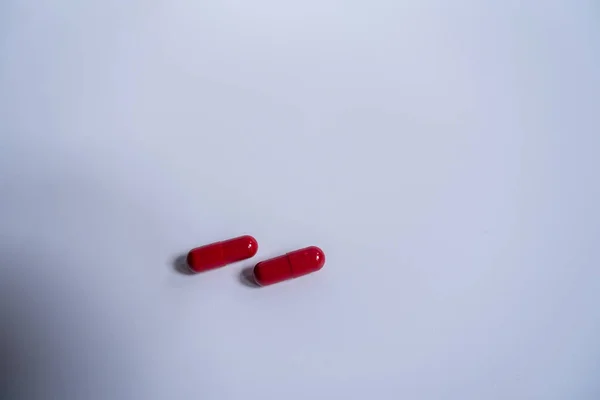 Two Red Pills Halved Middle Placed White Background — ストック写真