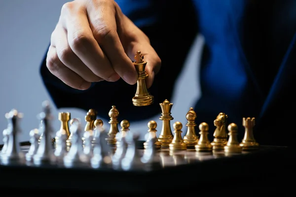 Unrecognizable Male Suit Holding Golden King While Playing Chess Gray — Stock Photo, Image