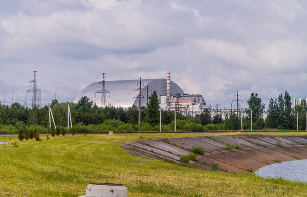Pripyat, Ukraine - June 10, 2021 - Reactor 4 of the Chernobyl power plant with the new safe confinement
