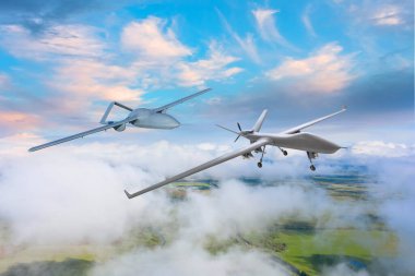 Dronlar birbiri ardına uçuyor. Bölgeyi gözetliyorlar.