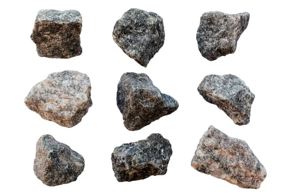 Beyaz arka planda izole edilmiş granit taşlar, üst manzara. Beyaz arka planda izole edilmiş çakıl taşları, üst manzara. Beyaz arka planda izole edilmiş taşlar. Beyaz arkaplanda gri çakıl taşları izole.