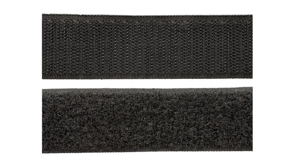 Contacto cinta aislada sobre fondo blanco, vista superior. Velcro negro sobre fondo blanco. Cierre de velcro para ropa aislada sobre fondo blanco, vista superior. Velcro negro, vista superior. — Foto de Stock