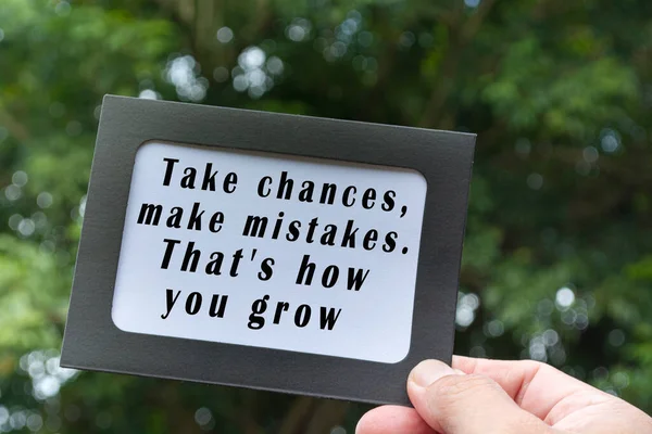 Motivational Inspirational Quote Hands Holding Framed Paper Blurred Green Tree — Stockfoto