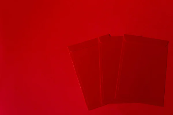 Concepto Año Nuevo Chino Paquetes Rojos Sobre Fondo Rojo — Foto de Stock