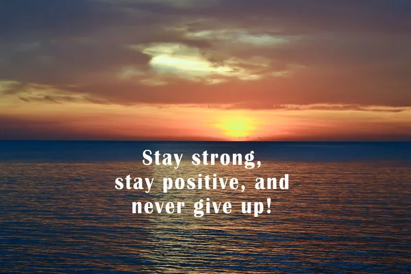 Motivational quote on background of sunset light. Never give up concept. — Stockfoto