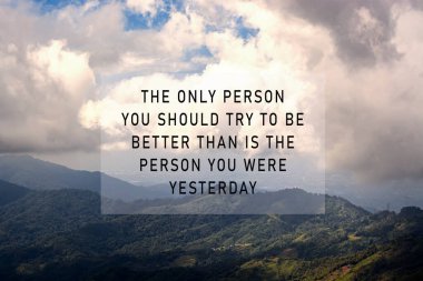 Motivational and inspirational quotes against mountain view background - The only person you should try to be better than is the person you were yesterday.