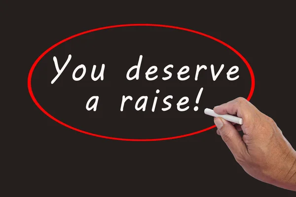 Male Hand Writes White Chalk Pencil Word You Deserve Raise — Stockfoto
