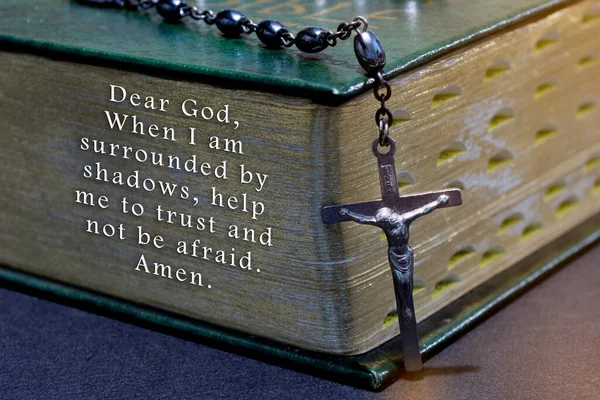 Prayer with the cross over bible - Dear God, when i am surrounded by shadows, help me to trust and not be afraid. Amen.