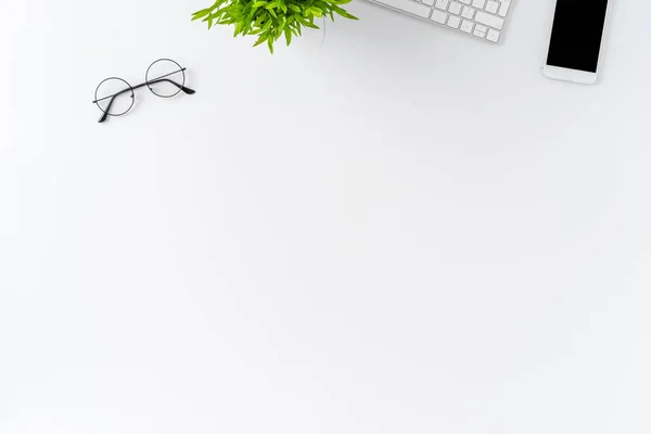 Office Desktop Concept Computer Keyboard Phone Eyeglasses Small Flower White — Stock Photo, Image