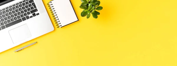 Office Desktop Laptop Mobile Phone Notebook Pen Yellow Background Copyspace — Stock Photo, Image