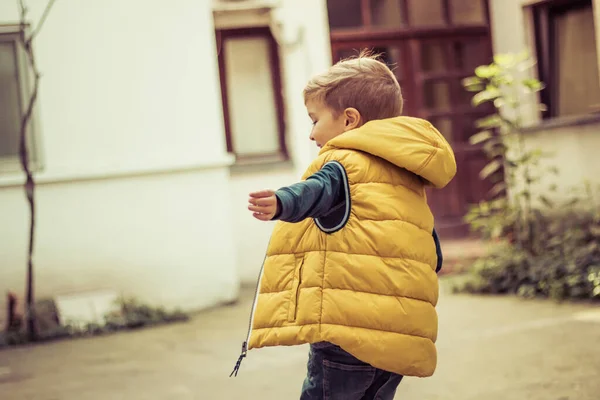 Little Boy Having Fun While Turning Arms Outstretched — Stockfoto