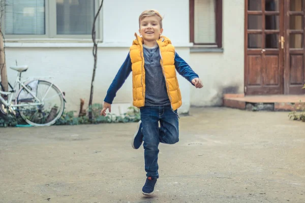 Happy Kid Having Fun Jumping One Leg Outdoors — Stockfoto