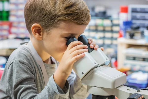 Small Science Student Examining Something While Looking Microscope Laboratory — 스톡 사진