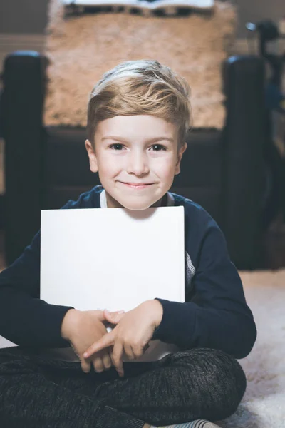 Smiling Little Boy Sitting Floor Book Looking Camera — Stock fotografie