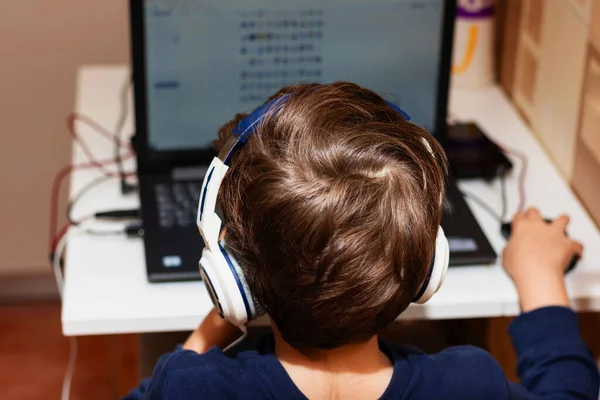 Rear View Kid Playing Online Video Games Laptop — Foto de Stock