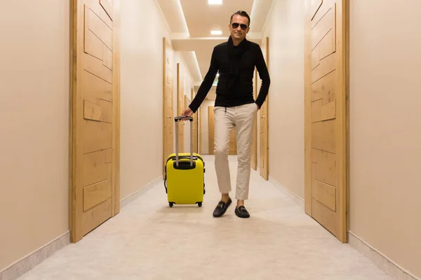 Happy Man Arriving Hotel Carrying Suitcase While Walking Lobby — Photo