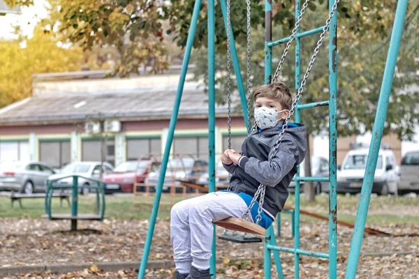 Cute Kid Protective Face Mask Swinging While Spending Day Park — Stock Photo, Image