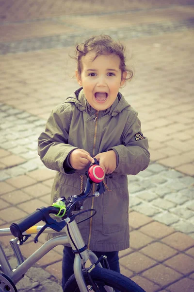 Cute Girl Having Fun While Ringing Bicycle Bell Shouting —  Fotos de Stock