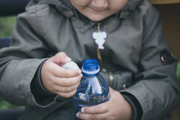 Close Child Opening Bottle Water — Photo