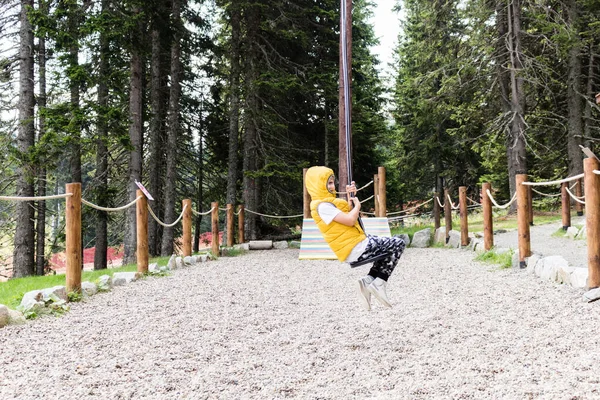 Playful Kid Having Fun Zip Line While Playing Forest — Stok fotoğraf