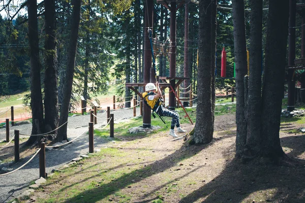 Carefree Boy Zip Lining Having Fun Roper Course Forest — Stok fotoğraf