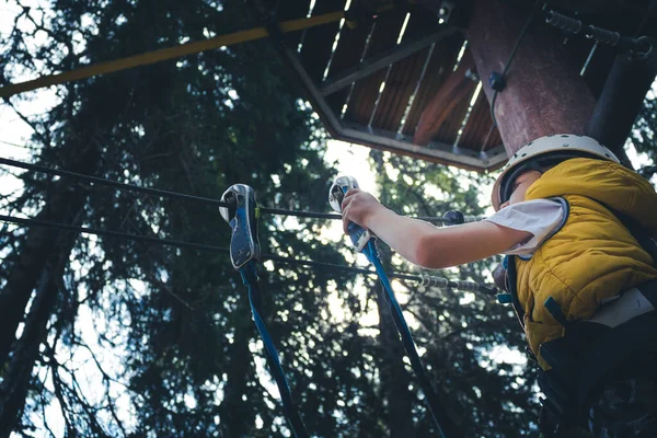 Low Angle View Small Boy Attaching Carabiner Rope Canopy Tour — Fotografia de Stock