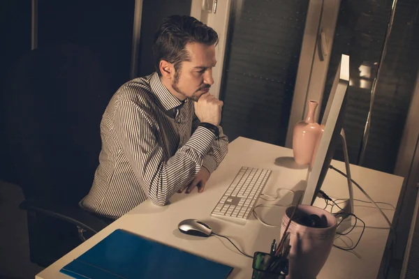 Thoughtful Businessman Working Computer Late Evening Home Office — Fotografia de Stock