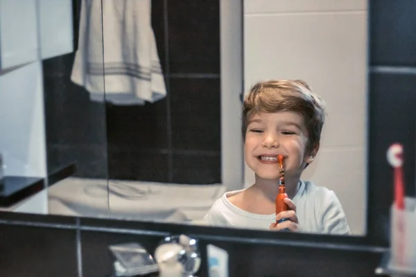 Small Kid Brushing Teeth Looking Himself Mirror — Photo