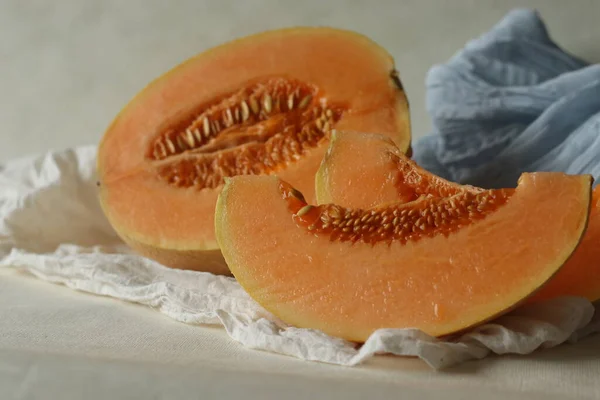 Muskmelon, also known as Cucumis melo, is a species of melon belongs to gourd family. It has ribbed, netted or smooth skin and a sweet, or bland flavour with or without musky aroma. Sliced into halves