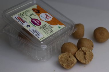 Mumbai, Maharashtra, India, April 16 2022: Dink Ladoo made by swara foods. Dinkache Ladoo are one of the nutrition rich ladoos which are made out of dink and dry fruits and dates.