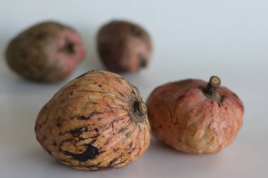 Ripe Red Custard Apple Fruit or Annona Reticulata Bullocks Heart. A fruit which is vary in shape. When ripe, the fruit is brown or yellowish, with red highlights and a varying degree of reticulation