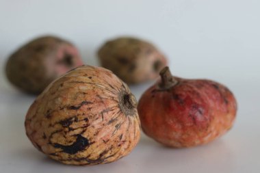 Ripe Red Custard Apple Fruit or Annona Reticulata Bullocks Heart. A fruit which is vary in shape. When ripe, the fruit is brown or yellowish, with red highlights and a varying degree of reticulation