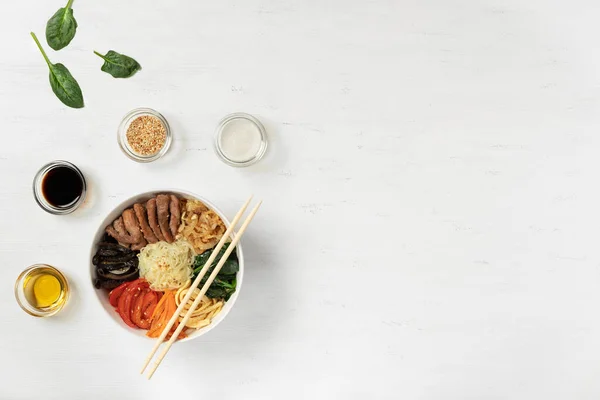 ingredients for chapchae in bowl ready for mix