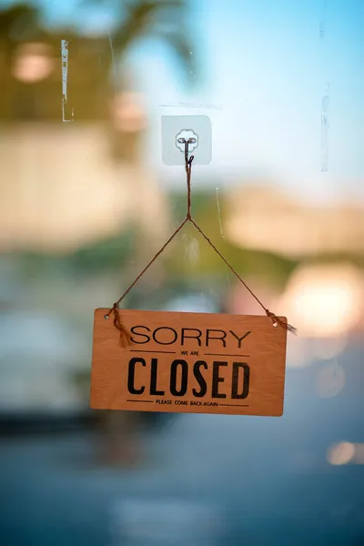 hangging wooden sign sorry we are closed please come back again, background mirror for restaurant or cafe