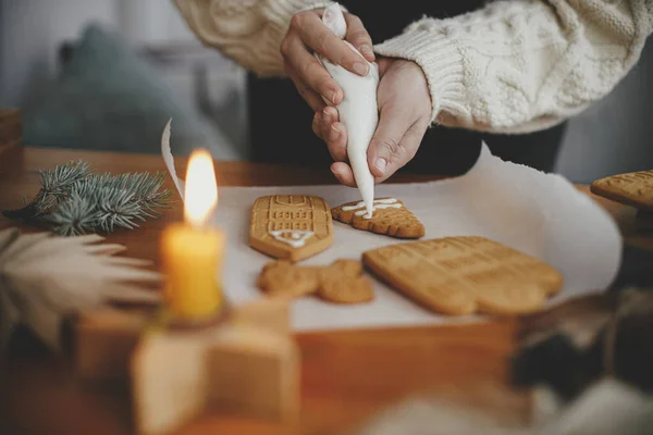 Decorating Christmas Gingerbread Cookies Icing Wooden Table Candle Ornaments Close — Stock Photo, Image