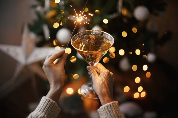 Hands Firework Light Champagne Glass Background Christmas Tree Lights Star — Stock Photo, Image