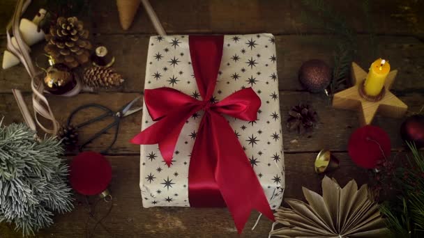 Merry Christmas Hands Opening Stylish Christmas Gift Red Ribbon Rustic — Stock Video