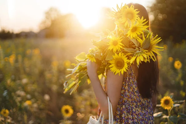 Stylish Young Female Floral Dress Walking Sunflowers Warm Sunset Light — стоковое фото