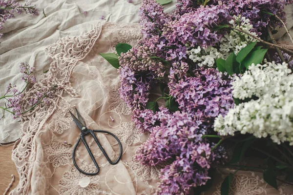Beautiful Lilac Flowers Scissors Petals Rustic Stylish Fabric Flat Lay — Foto de Stock