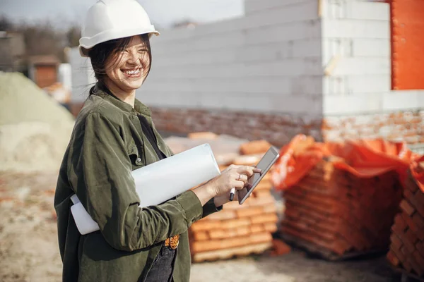 Happy Young Female Architect Tablet Checking Blueprints Building New Modern — Photo