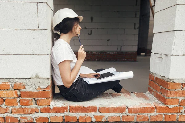 Stylish Happy Woman Engineer Hard Hat Looking Digital Plans Tablet — Photo