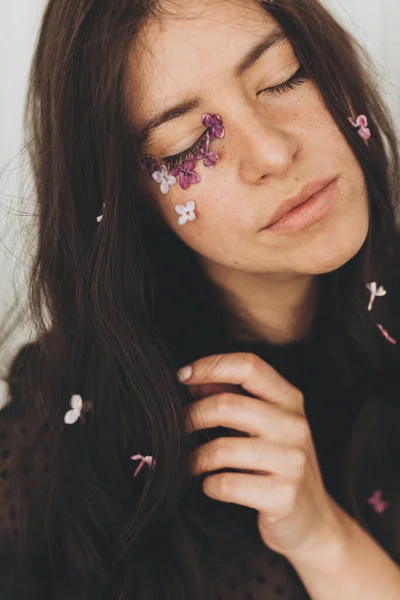 Beautiful Sensual Woman Lilac Petals Face Hair Moody Portrait Young — Stock Photo, Image
