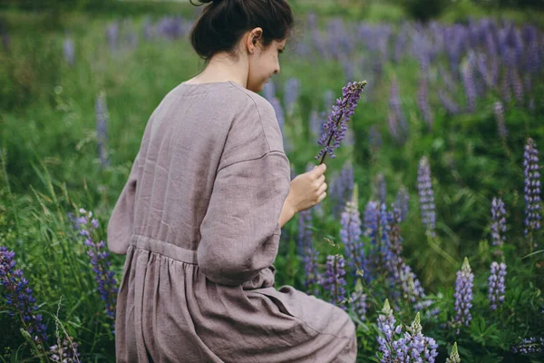 Stylish Woman Rustic Dress Gathering Lupine Meadow Atmospheric Image Cottagecore — Stock Photo, Image