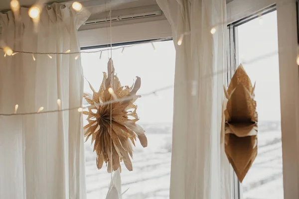 Stylish Paper Christmas Stars Lights Hanging Window Festive Decorated Boho — Stockfoto