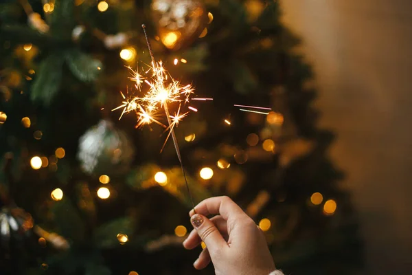 Happy New Year Burning Sparkler Female Hand Background Christmas Tree — Stock Photo, Image