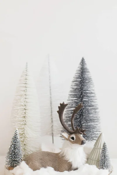Preparation For Christmas Silver Deer Toy Tree Cones And Red Beads On White  Wooden Backgroundchristmas Conceptspace For Text Stock Photo - Download  Image Now - iStock