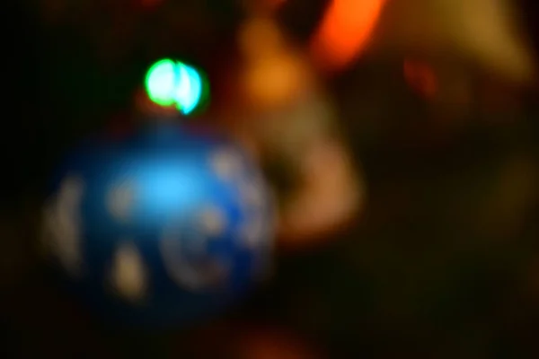 Abstract Blurred Image Christmas Tree Decoration Large Blue Ball Bokeh — Stockfoto