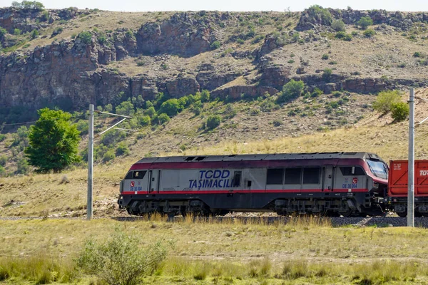 14 August 2022 Trains passing by the nature on railroad on a foggy day